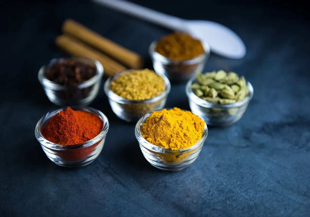 Assorted spices in small glass bowls